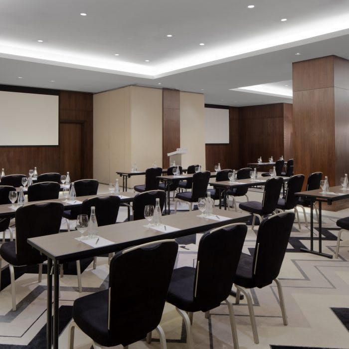 Conference Hall at Pullman Dubai, modern classroom setup for professional events.