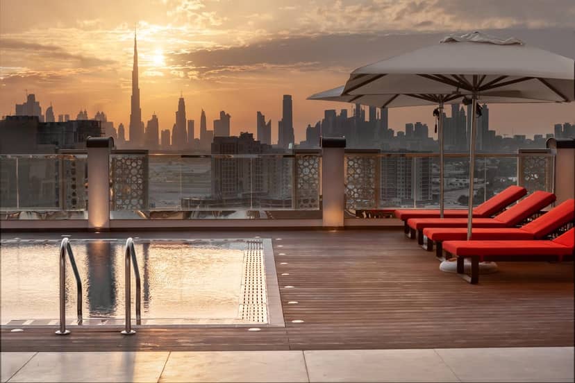 Rooftop banquet hall at DoubleTree Dubai with pool, ideal for upscale events and receptions.