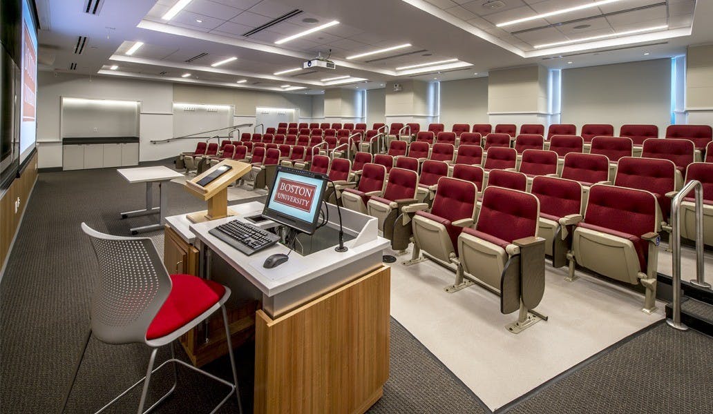 Modern conference room at Boston University with tiered seating for events and presentations.