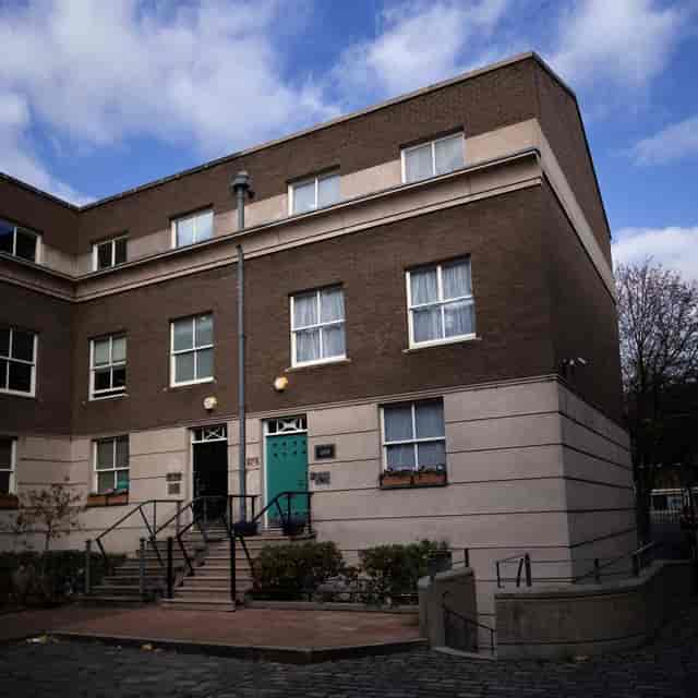 Millicent at Aspire House, a modern venue with large windows for events and meetings.