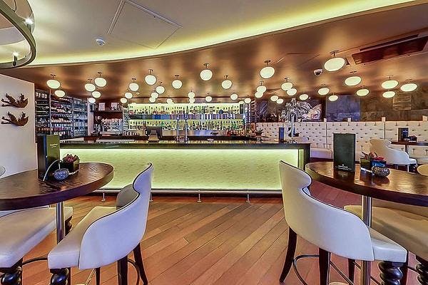 Sleek bar area at Chaophraya Leeds for networking events and social gatherings.