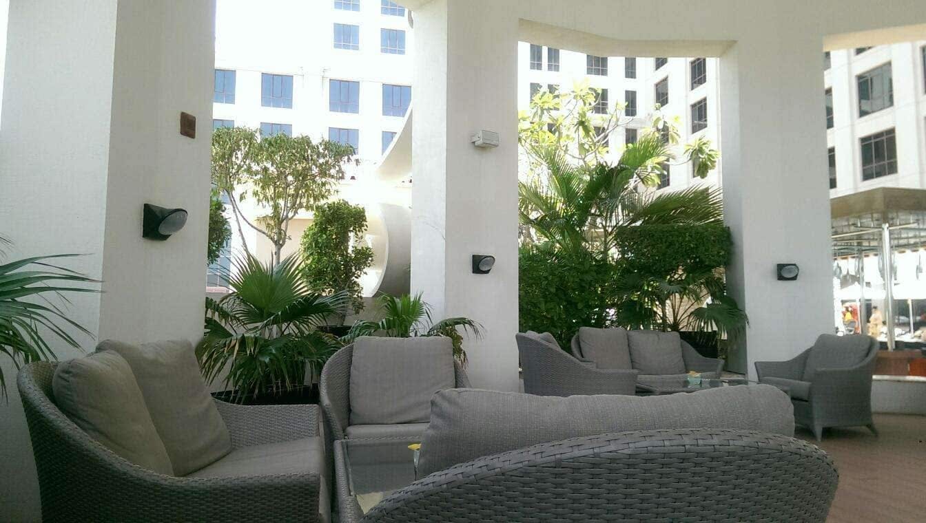 Mosaic Chill outdoor lounge at Kempinski Hotel, ideal for networking events and casual meetings.