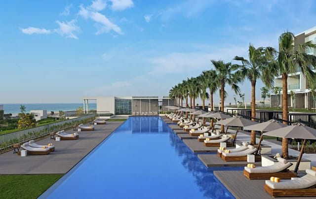Beachfront pool at Oberoi Al Zorah, ideal for outdoor events and gatherings.
