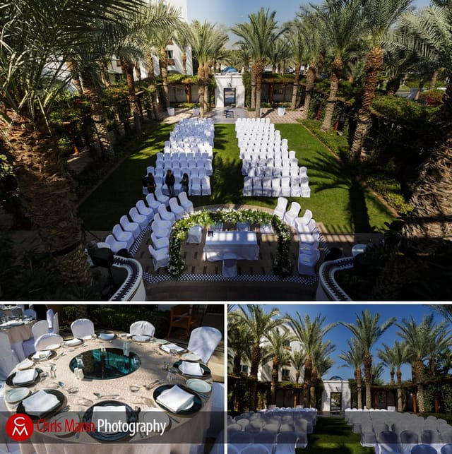 Fountain Garden in Dubai Creek Resort, elegant wedding setup with floral altar and greenery.