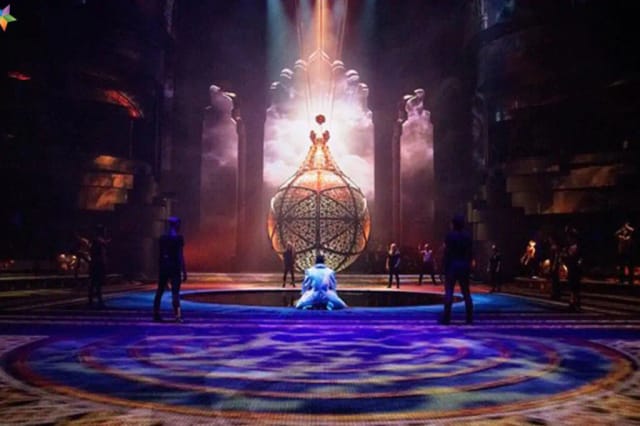 Pre-function area at La Perle with dramatic chandelier for corporate or entertainment events.