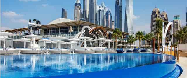 Luxurious restaurant venue with pool, ideal for corporate events and social celebrations.
