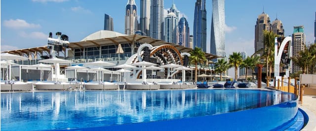 Luxurious restaurant venue with pool, ideal for corporate events and social celebrations.