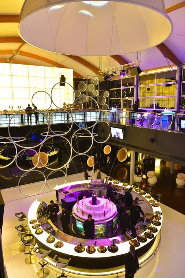 Upscale restaurant in zero gravity with stylish decor, perfect for events and gatherings.