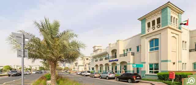 Event venue in Dubai Knowledge Park with modern architecture and palm trees.