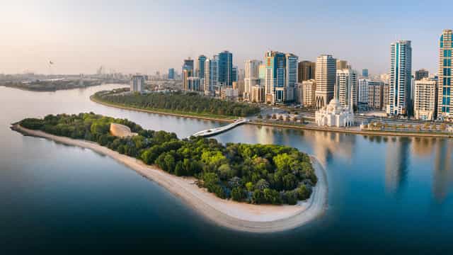 Playground in Al Noor Island: lush greenery, waterfront view, ideal for outdoor events.