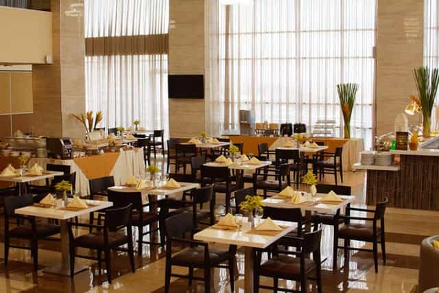 Molave Grand Ballroom at One Central Hotel, elegant dining for corporate events and gatherings.