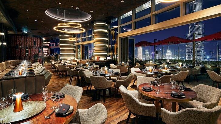 CÉ LA VI Dubai Club Lounge: modern decor, panoramic views for upscale events.