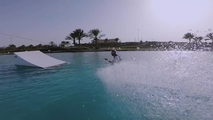 Dynamic water sports at Al Forsan Sports Resort for team-building events.