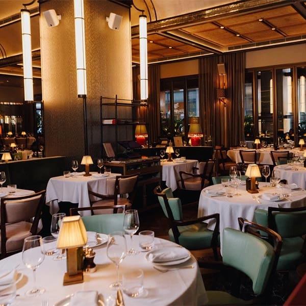 Elegant dining space in Alaya for upscale events and intimate gatherings.