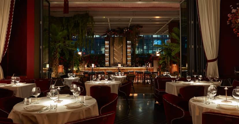 Elegant dining space in Shanghai for upscale events with lush greenery.