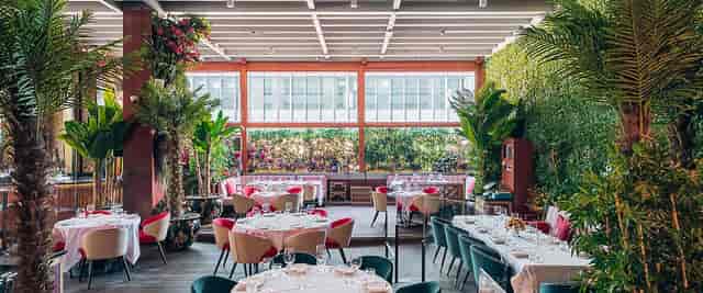Elegant terrace venue in Shanghai with lush greenery for upscale events and celebrations.