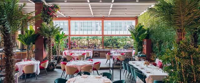 Elegant terrace venue in Shanghai with lush greenery for upscale events and celebrations.