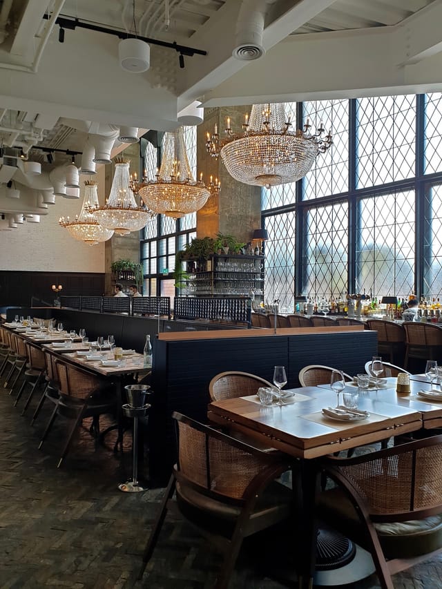 Stylish dining space at Land Brasserie, ideal for corporate dinners and private events.
