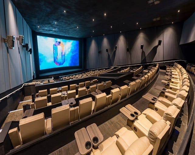 Modern cinema auditorium with plush seating at ODEON LUXE Swiss Cottage for events.