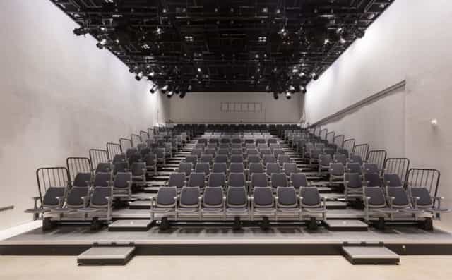 Tiered seating in Platform L venue, ideal for conferences and lectures.