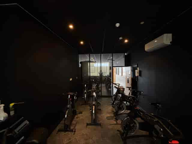 Modern fitness studio with stationary bikes for wellness events and team-building activities.