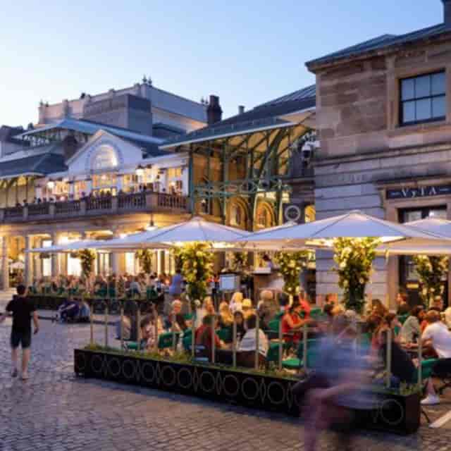Vibrant outdoor cocktail bar in VyTA Covent Garden, ideal for summer events and gatherings.