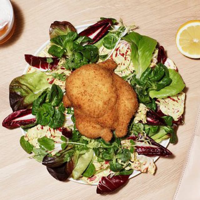 Fried chicken bird dish at ROSI Restaurant, perfect for themed events and gatherings.