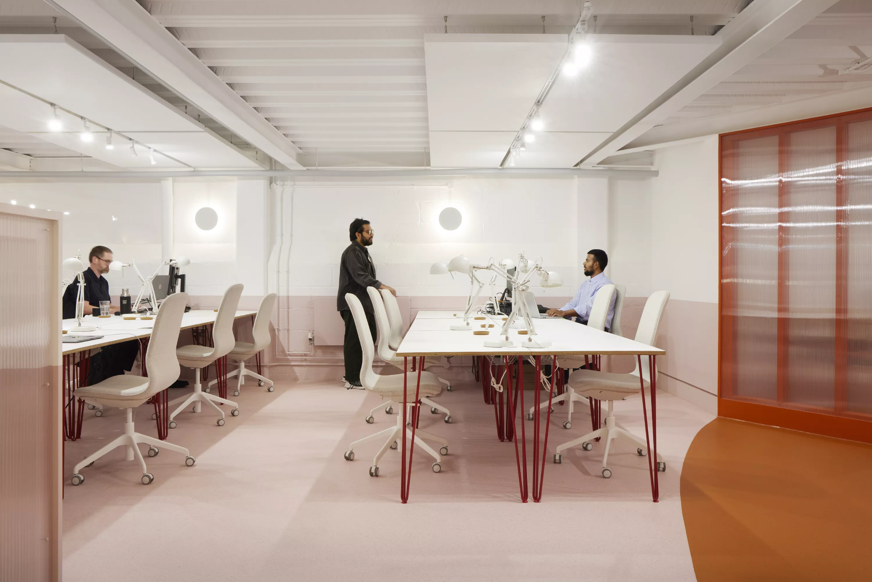 Modern minimalist meeting space in Tooting Works, perfect for workshops and brainstorming.
