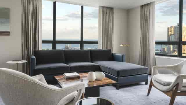 Modern lounge area in The Ritz-Carlton, Chicago for networking events and meetings.