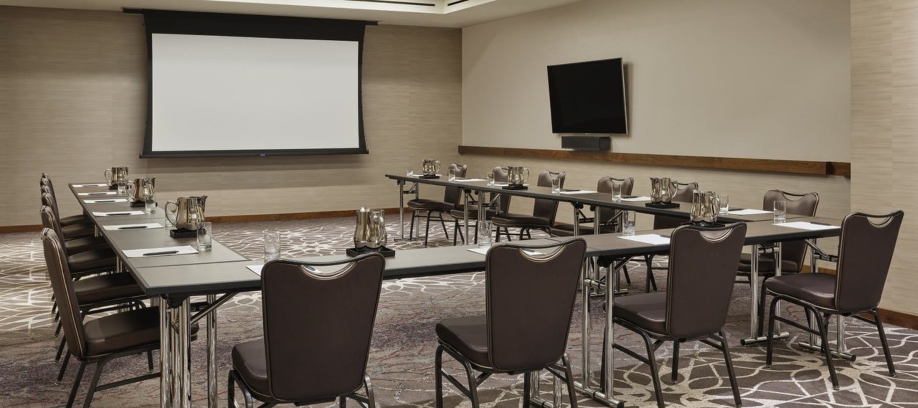 Loews Chicago Hotel conference center with U-shaped tables for professional events.