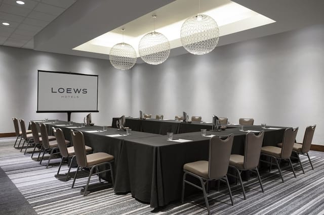 Loews Chicago Hotel conference room with U-shaped table for corporate meetings.