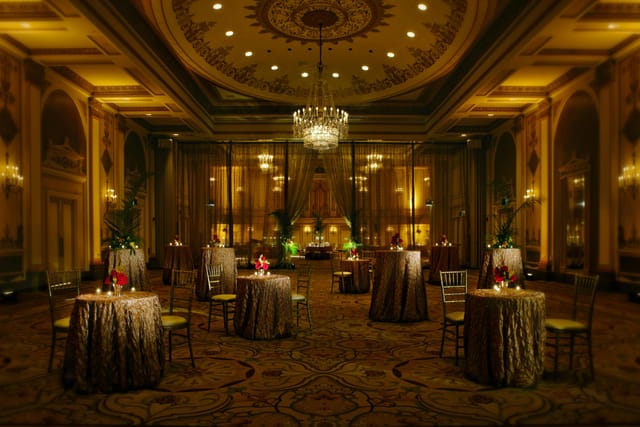Elegant ballroom at Palmer House Hilton with luxurious tables for upscale events.