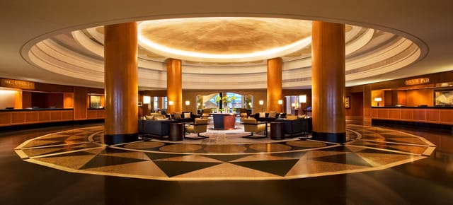 Elegant Sheraton Grand Chicago Riverwalk lobby, ideal for networking events and meetings.