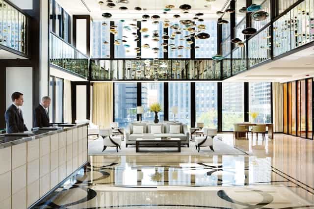 Modern hotel lobby at The Langham, Chicago with elegant decor for events and meetings.