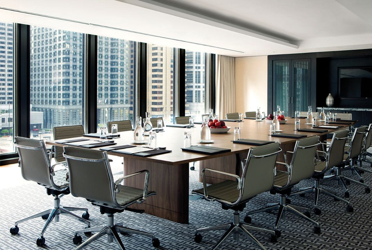 Modern conference room with city view at The Langham, Chicago for professional meetings.