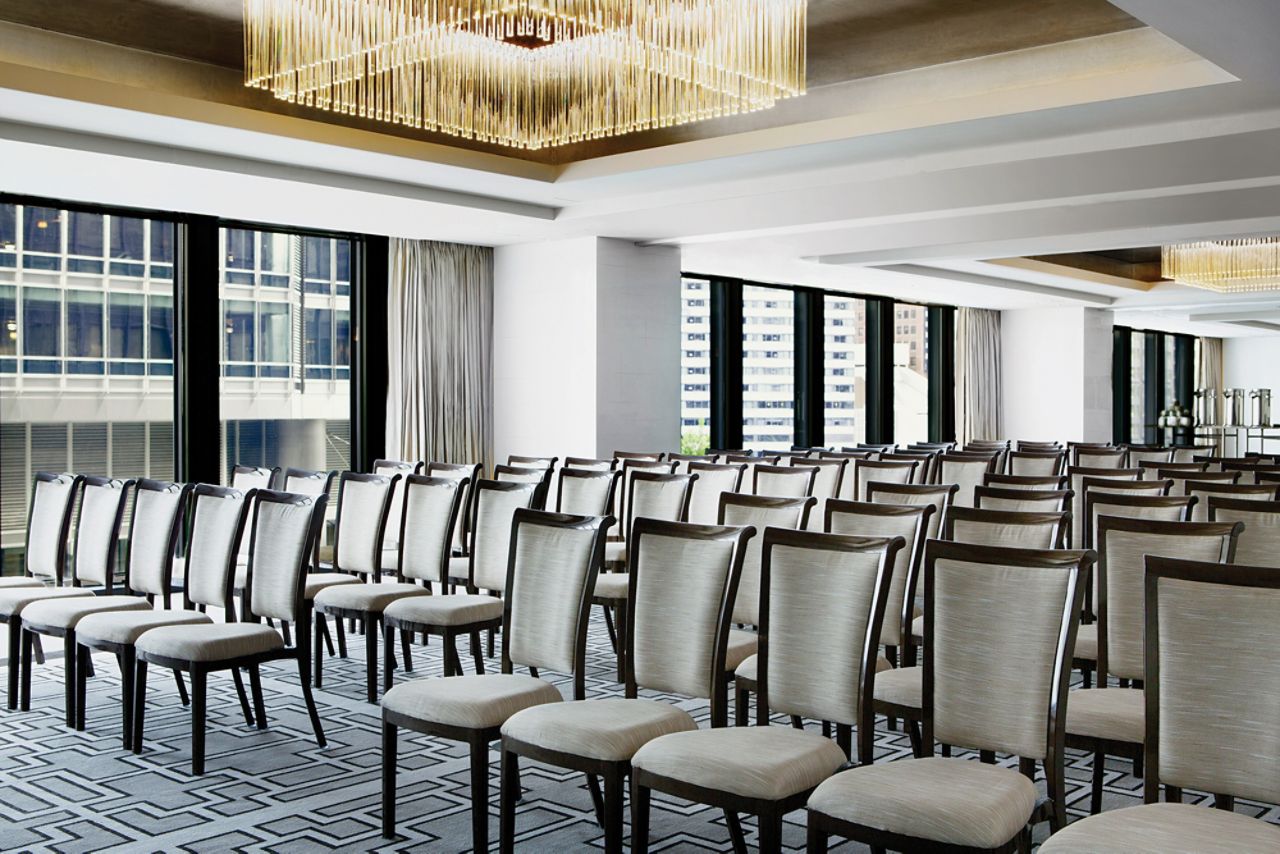 Meeting room at The Langham, Chicago with elegant chairs for conferences and presentations.