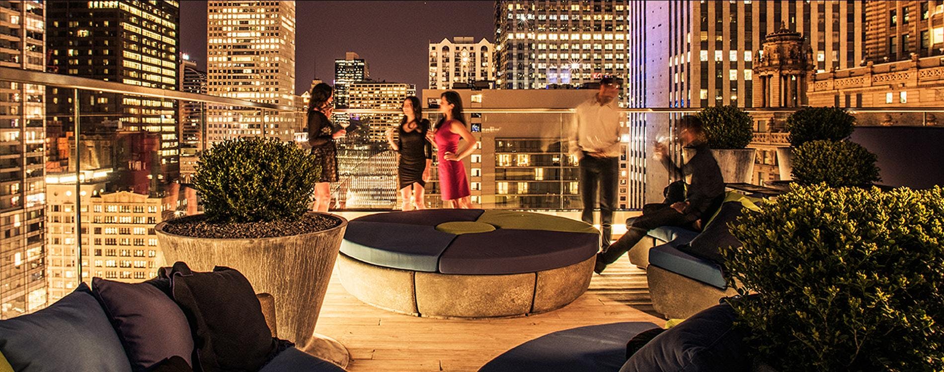 Cerise Rooftop at Virgin Hotels Chicago, vibrant event space with city skyline backdrop.
