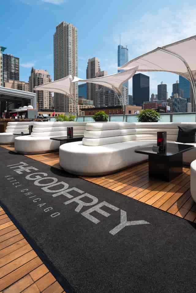 Rooftop Lounge at The Godfrey Hotel Chicago with skyline views, perfect for events.