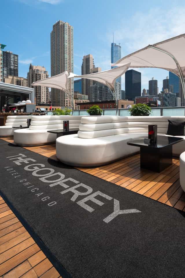 Rooftop Lounge at The Godfrey Hotel Chicago with skyline views, perfect for events.