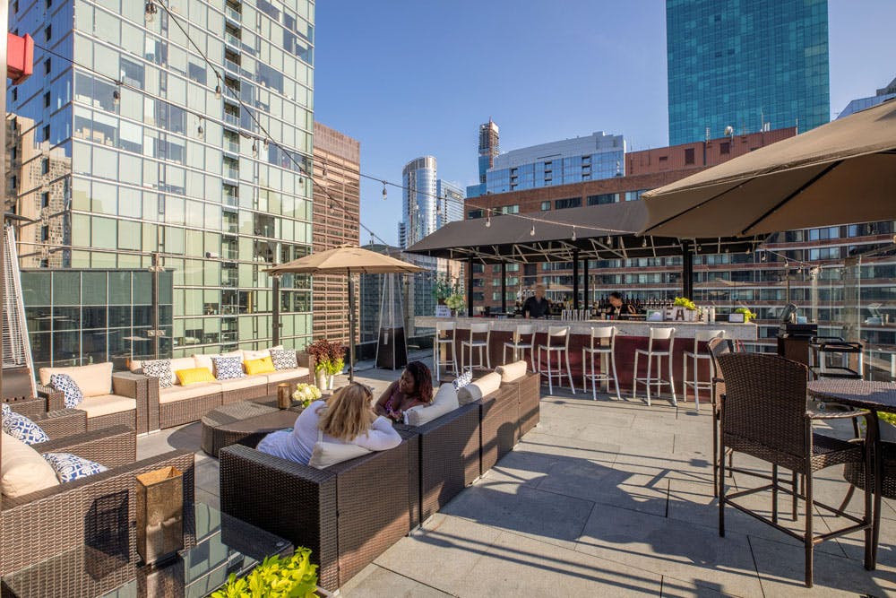 Sky Terrace at Ivy Hotel: modern rooftop venue with city skyline for events and gatherings.