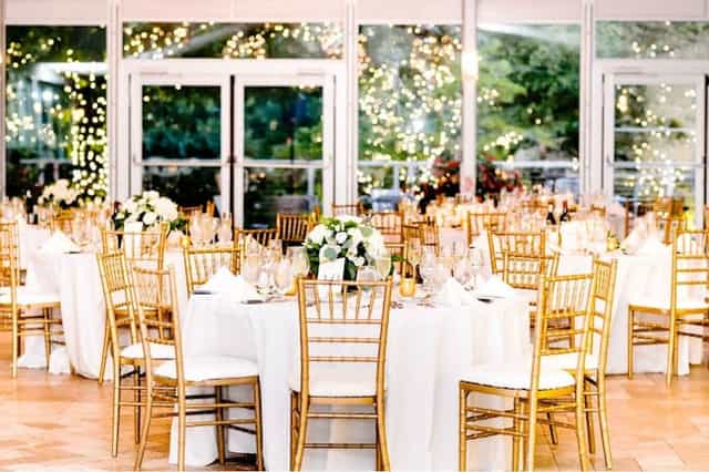 Elegant banquet space at Galleria Marchetti with floral centerpieces for weddings and galas.