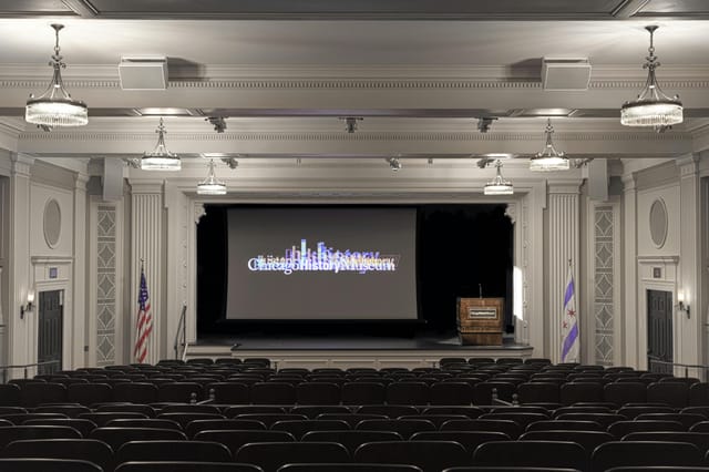 Chicago History Museum theater with tiered seating, ideal for conferences and screenings.
