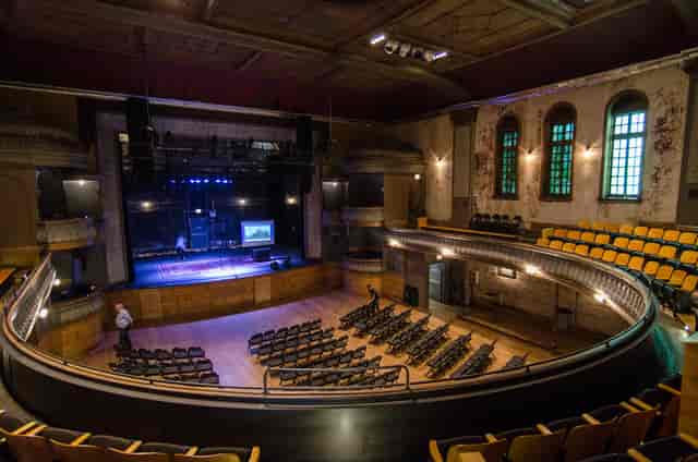 Main Hall in Thalia Hall: tiered seating for conferences and performances, historic charm.