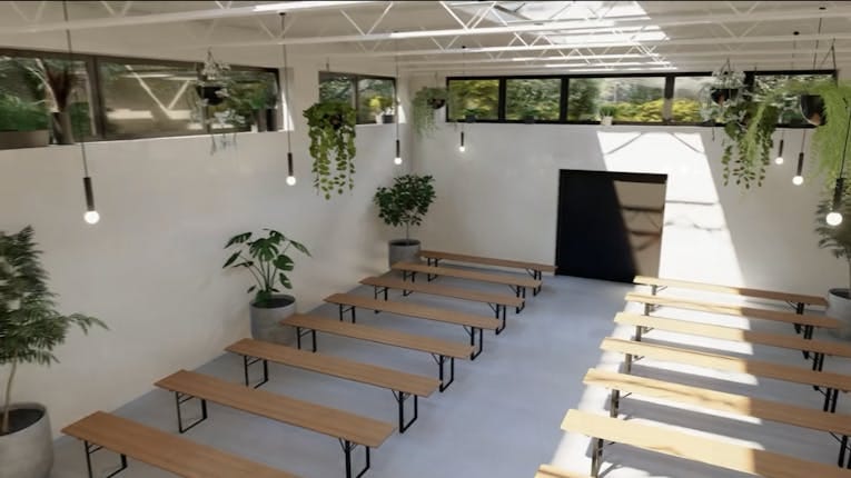 East Studio in Lytle Auditorium: bright event space with wooden benches for meetings and workshops.