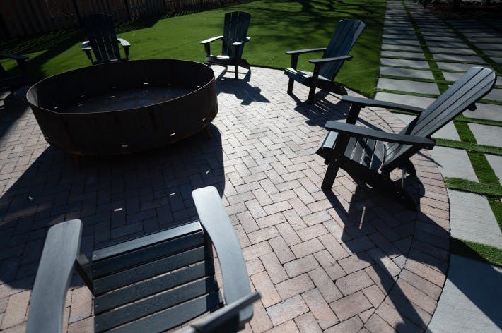 Cozy outdoor terrace with fire pit at Epiphany Center for networking events.