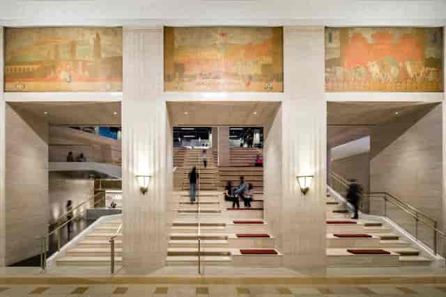 Elegant venue at Marshall's Landing, ideal for conferences and galas with grand staircases.