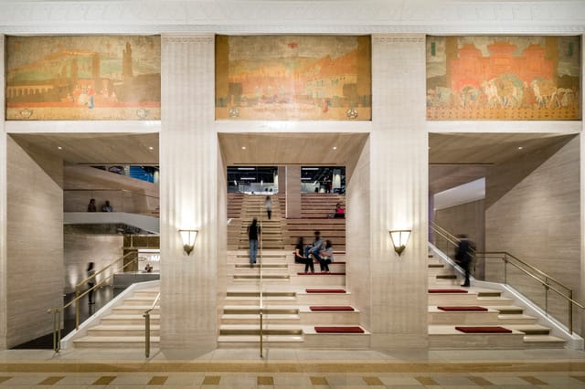 Elegant venue at Marshall's Landing, ideal for conferences and galas with grand staircases.
