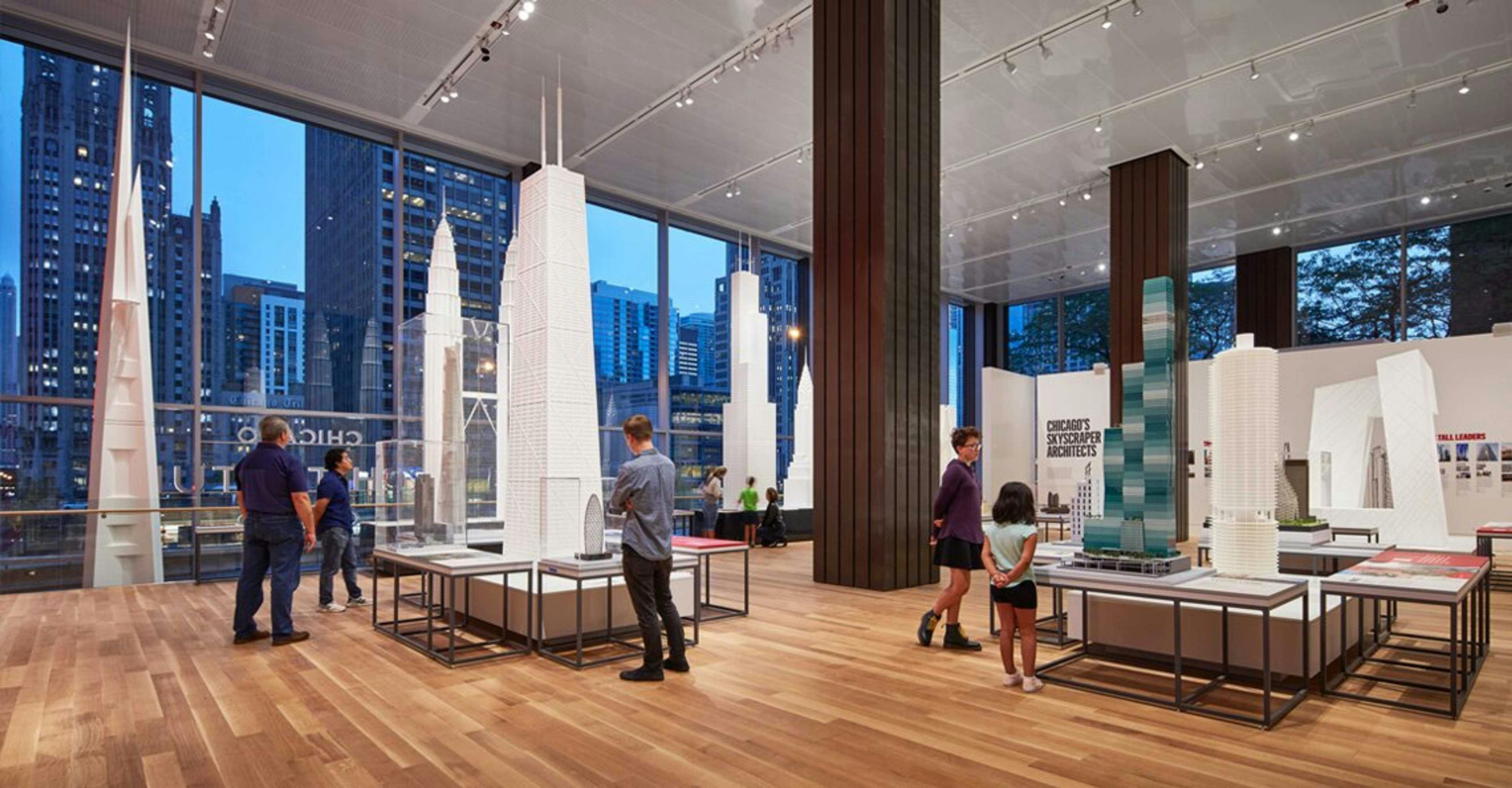 Modern event space at CAC Galleries, featuring large windows and city views for design exhibitions.