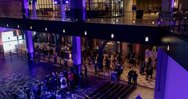 Vibrant event space at The Marquee Conference Center for networking and engagement.