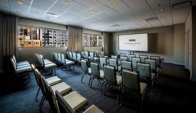 AirMail South meeting room with modern chairs for corporate presentations at The Old Post Office.